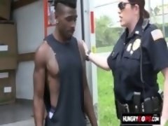 Hungry milf cops arrive at the hood looking for the biggest black cock and have to arrest a dude.
