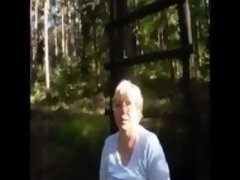 Breasted granny with glasses masturbating in the forest - PureSexMatch.com
