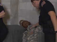 Two female police officers are having sex with a false soldier in jail
