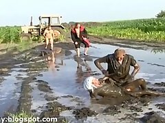 Grannies wrestle in the mud