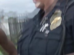 Black suspect is apprehended with a hot blowjob from two slutty MILFs.