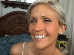Pretty blonde fools around with a dick
